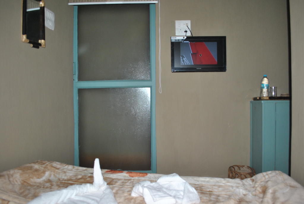 فاراناسي Shri Guest House الغرفة الصورة